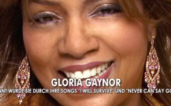 Sängerin Gloria Gaynor mit glänzenden Ohrringen und braunen Haaren